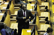 EYES OPEN: Finance Minister Nhlanhla Nene presents his first medium-term budget policy statement in parliament on Wednesday