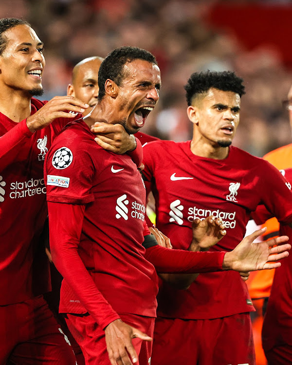 Liverpool's Joel Matip celebrates with Luis Diaz and Virgil Van Dijk