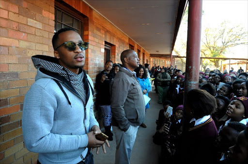 June 03, 2016. Soapie star SABC1's Uzalo Ntokozo Dlamini â€“ Mastermind Maphumulo during a visit by the Uzalo actors at Mosupatsela High School in Kagiso. They were there to motivate school pupil after they head that the school was one of the best performiing school in Gauteng. Pic : Tsheko Kabasia. © Sunday World.