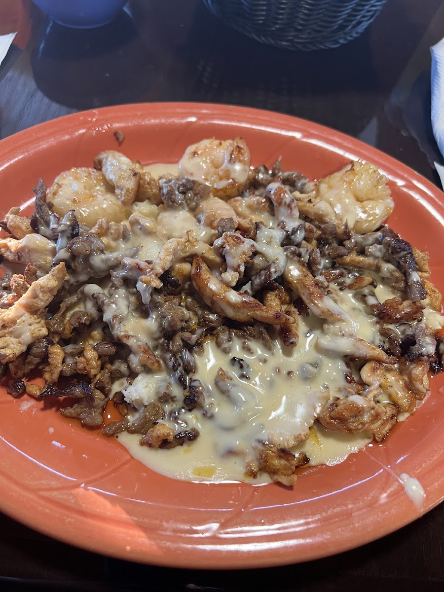 meat, shrimp, and cheesey sauce