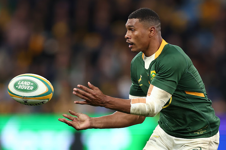 Springbok flyhalf Damian Willemse passes the ball during the Rugby Championship match against the Wallabies in Sydney on September 3 2022.