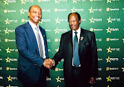 Mining magnate Patrice Motsepe and Zion Christian Church head   Bishop Barnabas  Lekganyane at the launch of TymeBank deal. /SUPPLIED