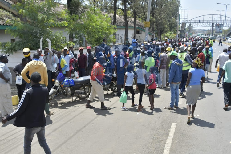 Motorists queue for fuel at Total petrol station as fuel shortage continues to bite various parts of the country on April 12, 2022.