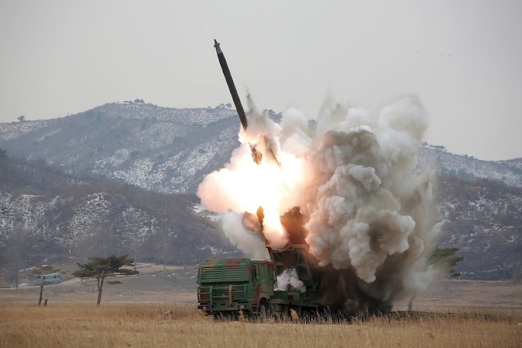 A new multiple launch rocket system is test fired in this undated file photo released by North Korea's Korean Central News Agency (KCNA) in Pyongyang. Picture: REUTERS