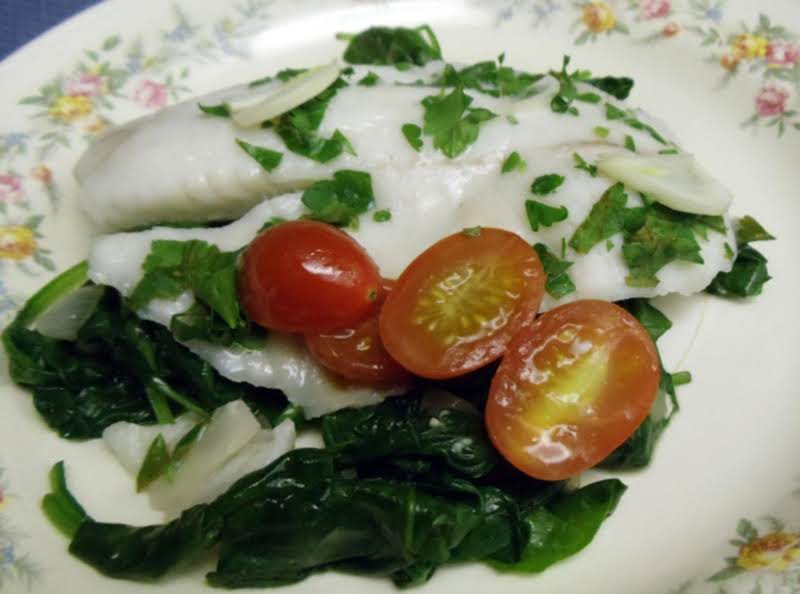 Greek Tilapia Over Wilted Spinach