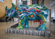 One of several colourful rhino sculptures welcoming guests to World Travel Market Africa at Cape Town International Convention Centre on April 10 2019. 