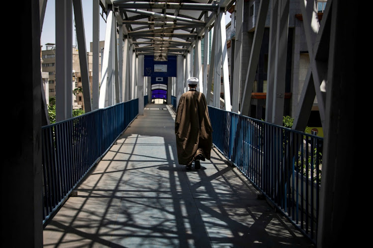 A cleric man walks through an overpass in Tehran, Iran June 25, 2019. Picture: WANA NEWS AGENCY VIA REUTERS