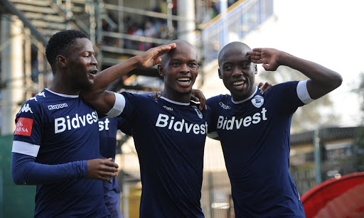 Phumlani Ntshangase (C) celebrating his goal with teammates Phakamani Mahlambi (L) and Ben Motshwari (R) during the Absa Premiership match between Bidvest Wits and Maritzburg United at Bidvest Stadium on May 07, 2017 in Johannesburg, South Africa.