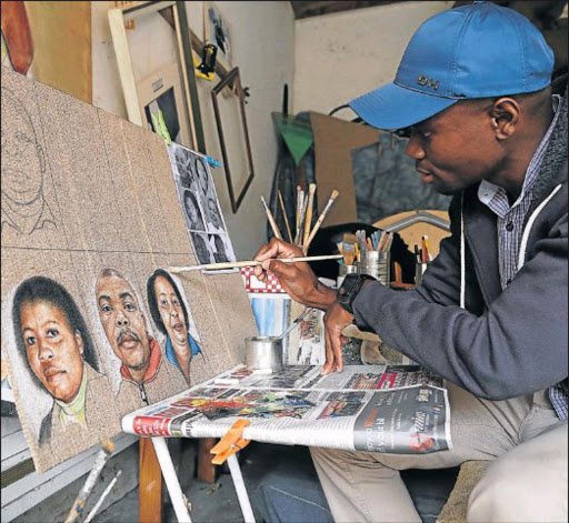 Parkside portrait artist Wonga Maxiniva works off photographs to achieve a realistic likeness of his subjects, such as EL executive mayor Xola Pakati, left. Maxiniva has hung a painting of Nelson Mandela and an old Ndebele woman at the EL Fine Art Society exhibition. Picture: MARK ANDREWS