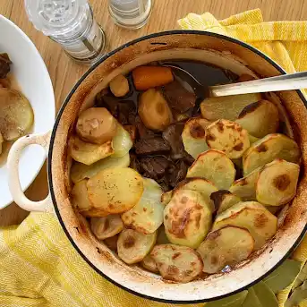 Dutch Oven Pot Roast with Carrots and Potatoes - Feast and Farm