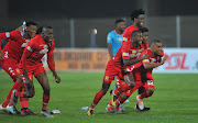 Highlands Park players celebrate after Mokete Mogaila scored the winning penalty.  after winning on penalties during the MTN8 2019 Semi Final 2nd Leg mat