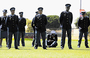 HEATWAVE BLUES: Some police officers succumbed to the heat during the handing over of the Sword of Command and long service awards ceremony in Parow yesterday.