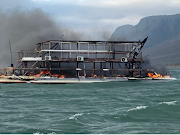 A fire on a Shayamanzi houseboat has led to the death of a crew member and guest, with another staff member missing.