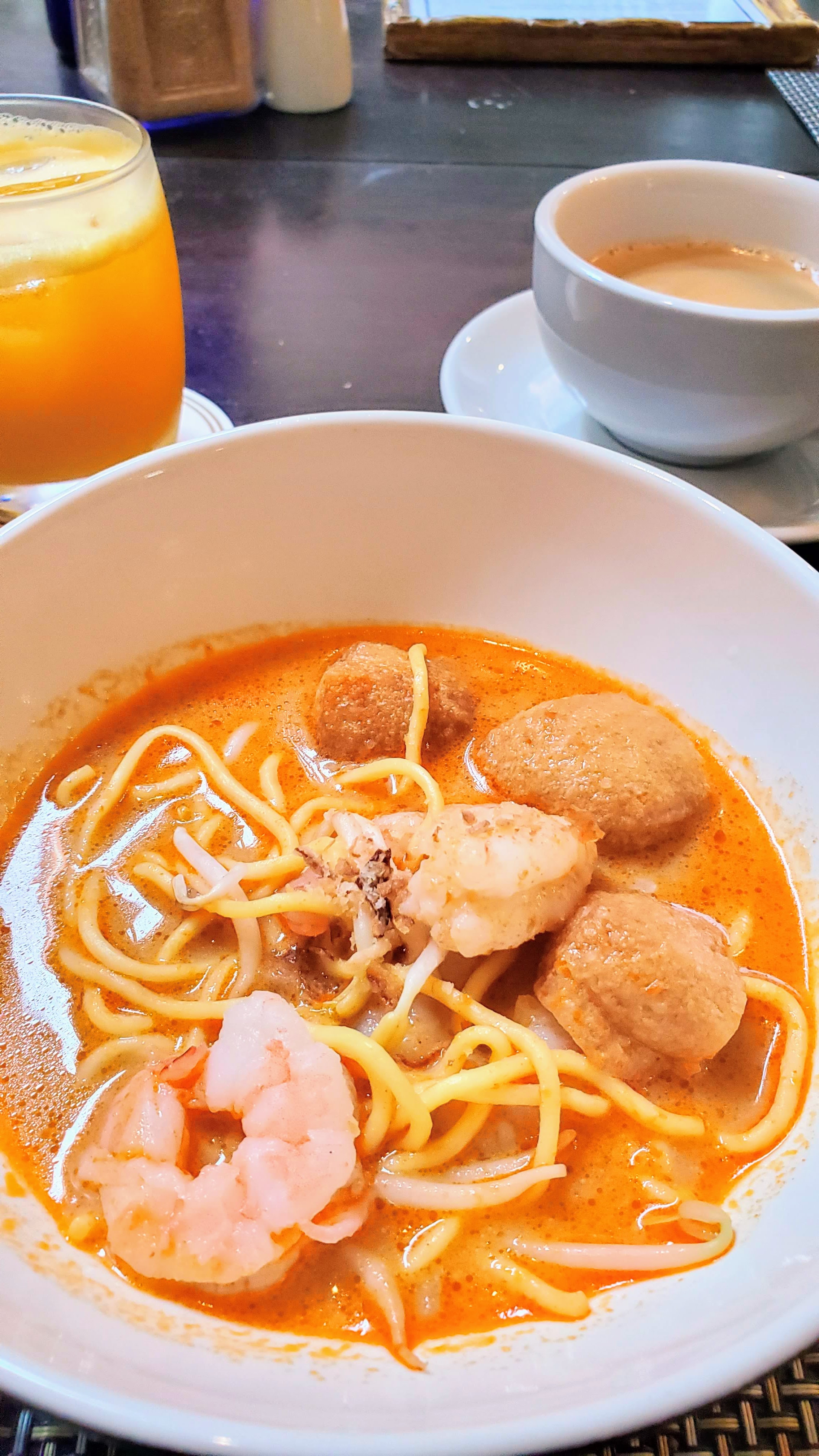 Food Highlights of Penang: Curry Mee, a coconut milk base curried soup with yellow noodles that is more rich then the Hokkien Mee