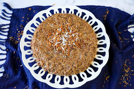 Light German Chocolate Cake ready to be sliced.