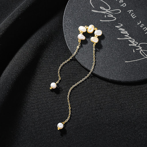 Title 5, Natural Shaped Long Tassel Pearl Ear Bone Clip....