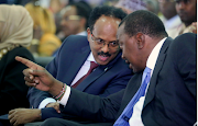 Somalia's President Mohamed Abdullahi Farmaajo (L) has directed the prime minister to prepare a parliamentary election. 