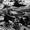 woman cooking on rooftop 1988<br />
foto: © Shahidul Alam