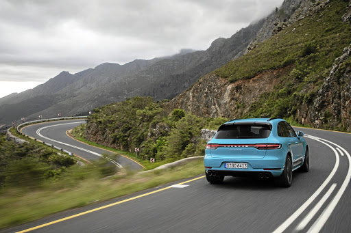 The Macan Turbo's all-wheel-drive and sticky Michelin Latitude 3 tyres let you push the limits surprisingly high around gnarly curves.