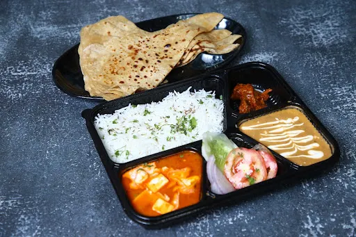 Paneer Butter Masala + Dal + Rice + Paratha + Raita or Salad