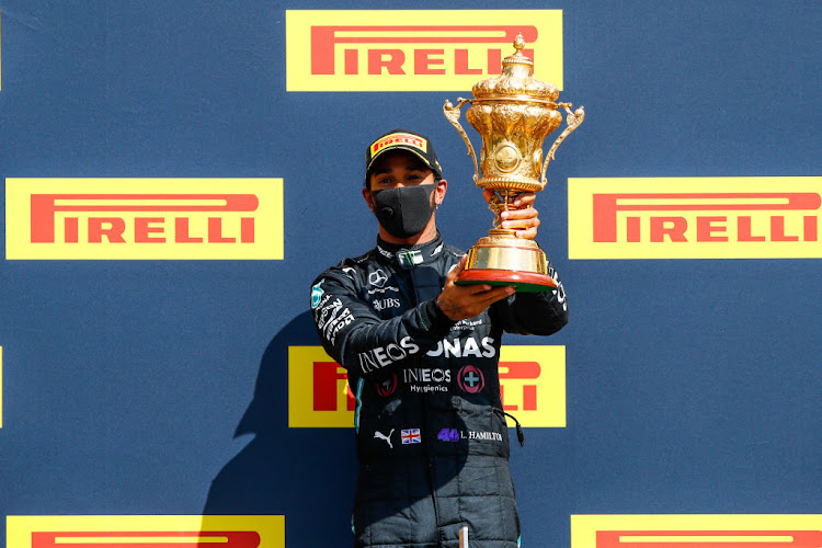 Race winner Lewis Hamilton of Mercedes celebrates after the 2020 British Grand Prix at Silverstone, Northamptonshire.