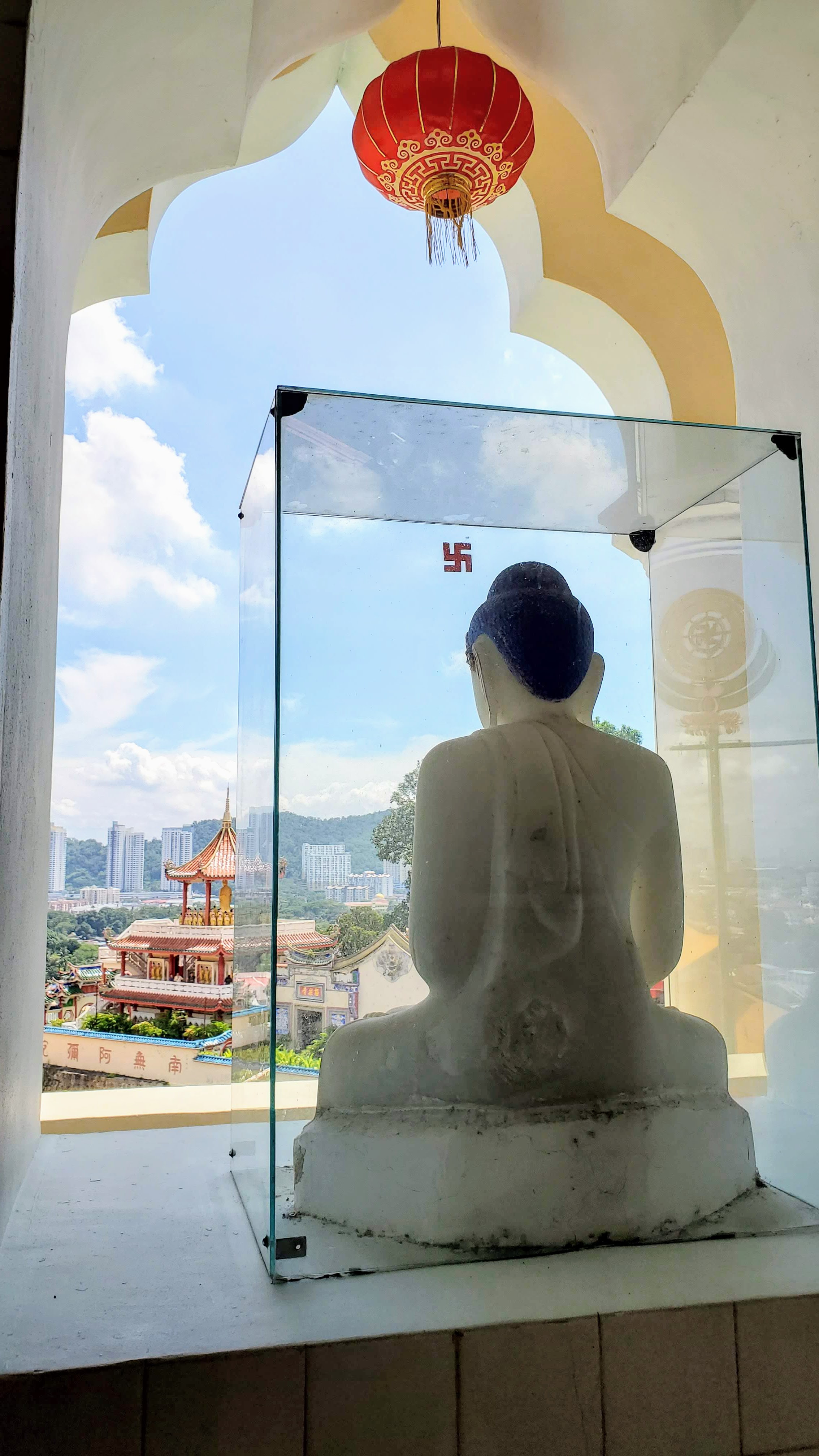 Visiting Kek Lok Si: What makes it unique is that among its millions of Buddhas it shows the blending of cultures that is so representative of Malaysia by including many stylistic representations of Buddha.