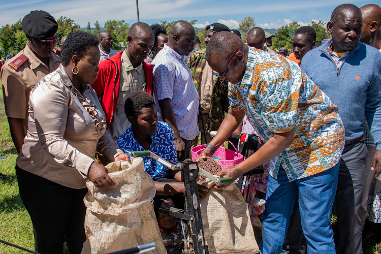 Information and Communication Technology (ICT) Cabinet Secretary Eliud Owalo during distribution of food to displaced families in Nyakach and Nyando sub counties on Monday.