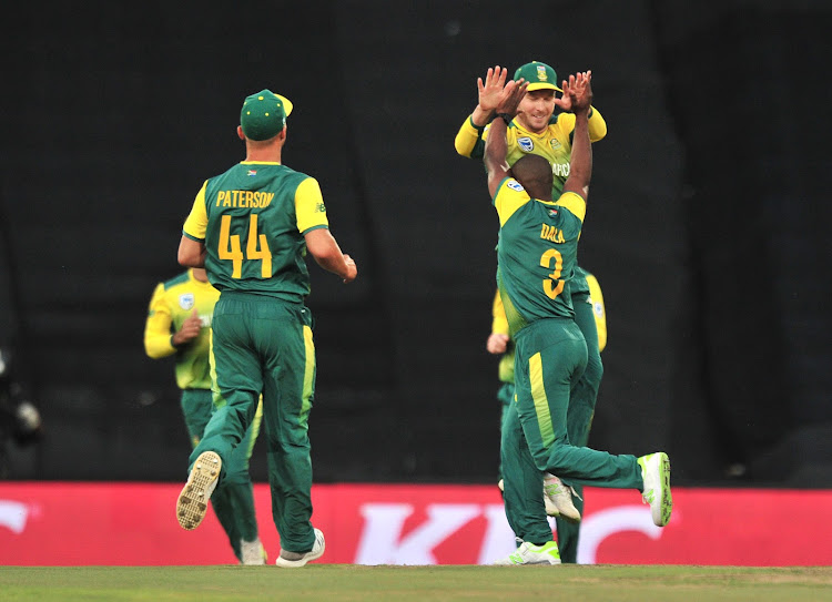 Junior Dala of South Africa celebrates with teammates the wicket of Virat Kohli of India during the 2018 2nd T20 match between South Africa and India at Supersport Park, Pretoria on 21 February 2018.