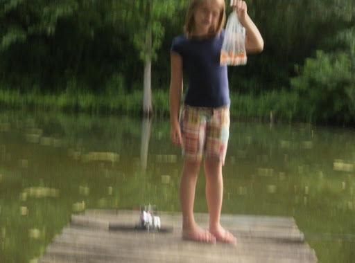 MY GRANDDAUGTHER AT OUR HOUSE .SHE GOT TO STAY WITH US FOR TWO WEEKS .WE HAD SO MUCH FUN FISHING .