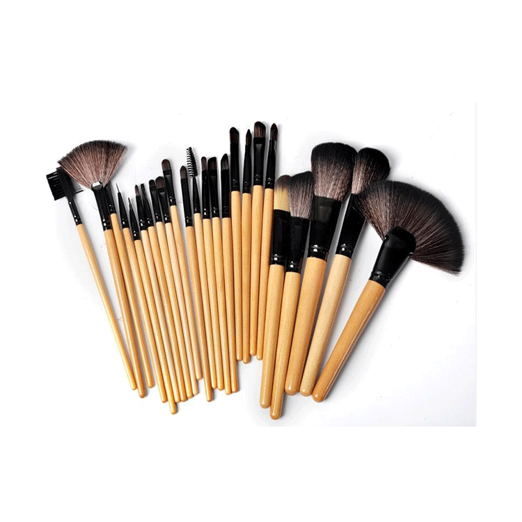 Kit completo de 24 pincéis de maquiagem com cerdas de pelo de cavalo e cabo de madeira preta, para um acabamento impecável.