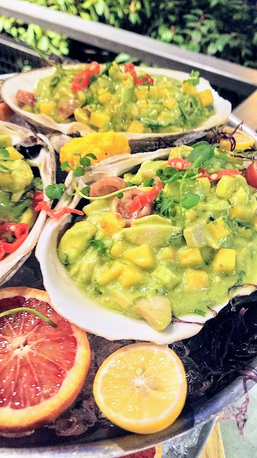 King Tide Fish and Shell, Ceviche with Surf Claim, Avocado Aguachile, Sweet Potato Chips