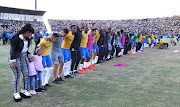 Mamelodi Sundowns players celebrate with the fans, family and relatives and the coaching stuff after a 5-0 Caf Champions League first leg quarterfinal win over Al Ahly in Pretoria on April 6 2019.