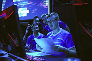 Full-time eSports player Ruan van Wyk, right, spends between six and eight hours a day playing CS:GO, and it paid off when his team, Bravado, won the R350,000 first-place prize at a tournament two weeks ago.