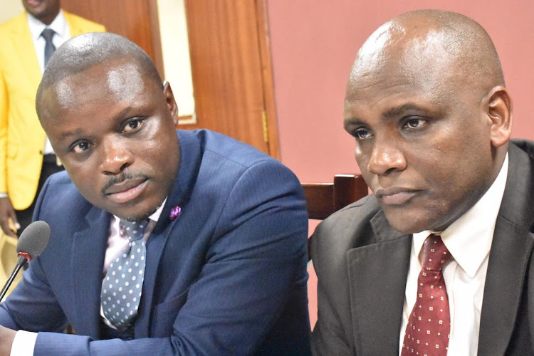 Nairobi County Chief Oiffcer for Health Washington Makodingo (left) and an officer from the health department at City Hall on June 26, 2019