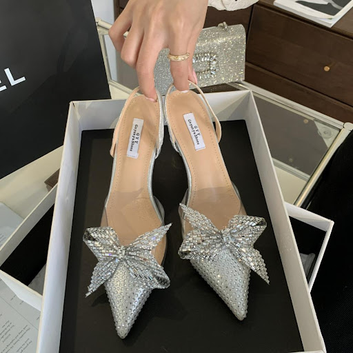 Title 18, Pointed toe high heels with a graceful bow, for...