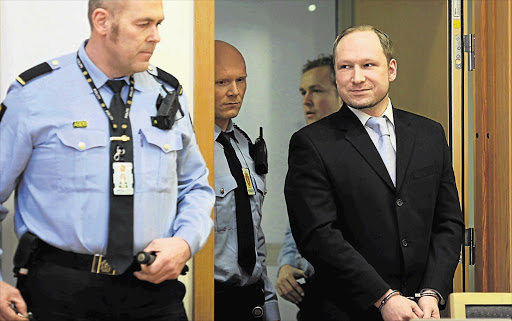 Norwegian anti-immigration militant Anders Behring Breivik arrives for a court hearing in Oslo. He has confessed to killing 77 people in July but pleaded not guilty.