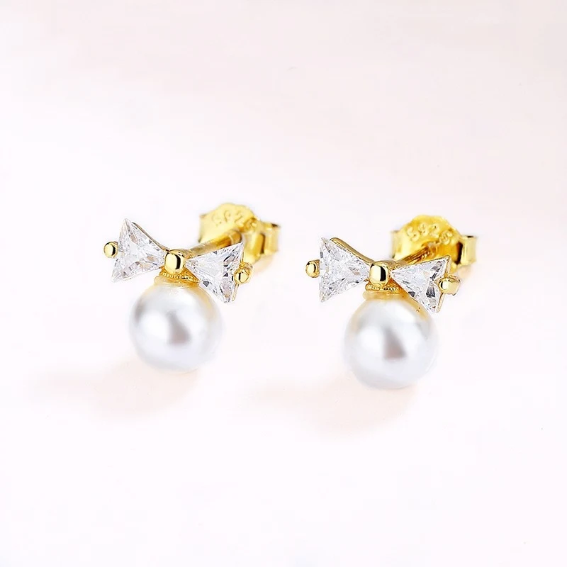 Pendientes de lazo con perlas para mujer, adorables y dulces, perfectos para añadir un toque femenino y elegante a tu look diario