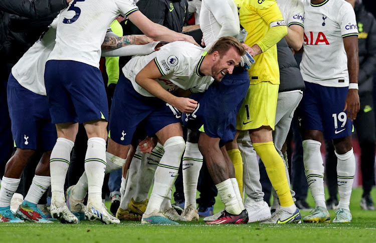 Tottenham Hotspur players celebrate with Harry Kane after the Premier League match against Manchester City where he became his club's all-time top goalscorer at Tottenham Hotspur Stadium in London on February 5 2023.