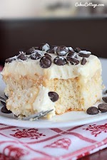 Cannoli Poke Cake Recipe was pinched from <a href="http://cakescottage.com/2015/02/04/cannoli-poke-cake-recipe/" target="_blank">cakescottage.com.</a>