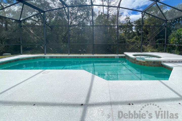 Southwest-facing pool deck with no rear neighbours at this Emerald Island vacation villa