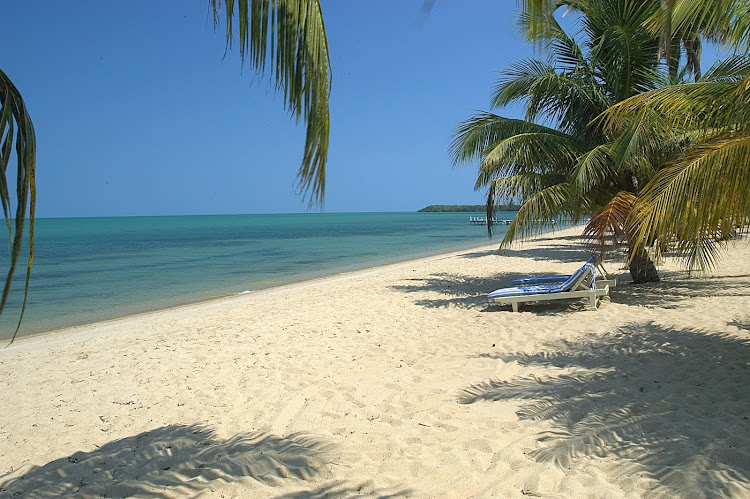 Sparkling sand on the coast of Belize.