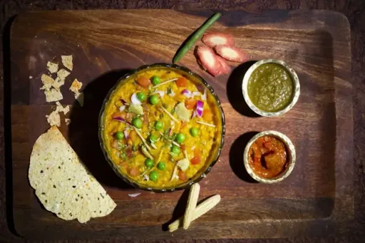 Masala Veggie Khichdi Served With Achar, Papad