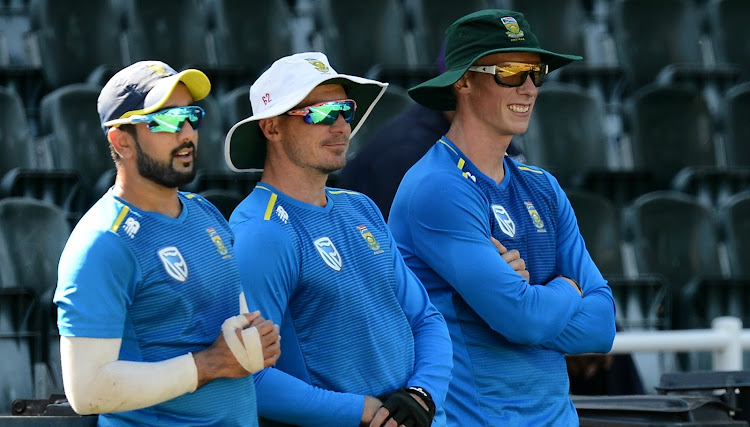 Tabraiz Shamsi , Dale Steyn and Rassie van der Dussen watch training from the sidelines at Bidvest Wanderers on March 1 2019.