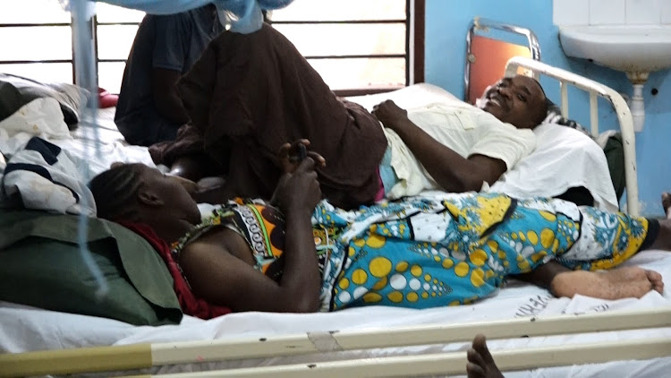 Patients sharing a bed the Malindi Subcounty Hospital wards.