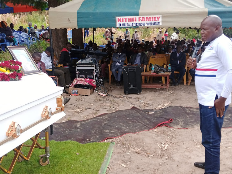 Former Yatta MP Francis Mwangangi addressing mourners during a burial ceremony at Mumbuni in Machakos on Wednesday, July 20.