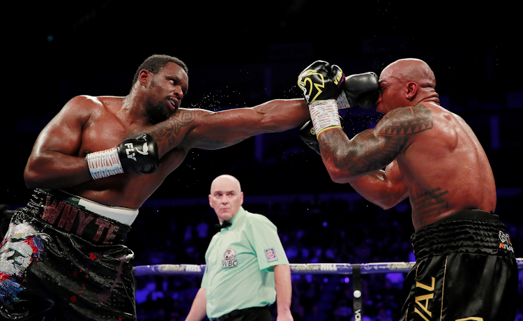 Dillian Whyte lands a punch against Oscar Rivas