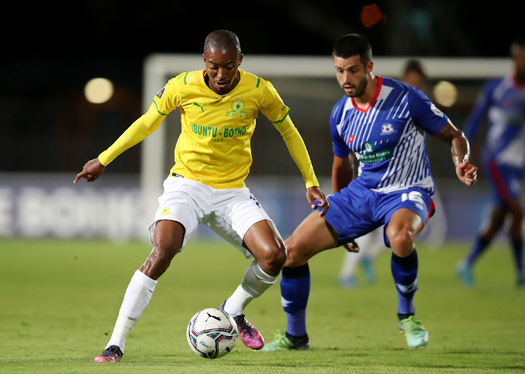 Maritzburg United's Keegan Ritchie challenges Mamelodi Sundowns' Thapelo Morena in the DStv Premiership match at Harry Gwala Stadium in Petermaritzburg on March 5 2022.