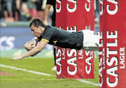 SENSATION: Handre Pollard of SA  dives over for his  try  against  New Zealand at Ellis Park on SaturdayPhoto: Duif du  Toit/Gallo Images