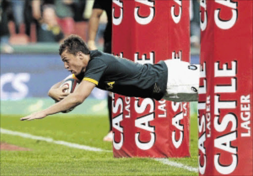 SENSATION: Handre Pollard of SA dives over for his try against New Zealand at Ellis Park on SaturdayPhoto: Duif du Toit/Gallo Images