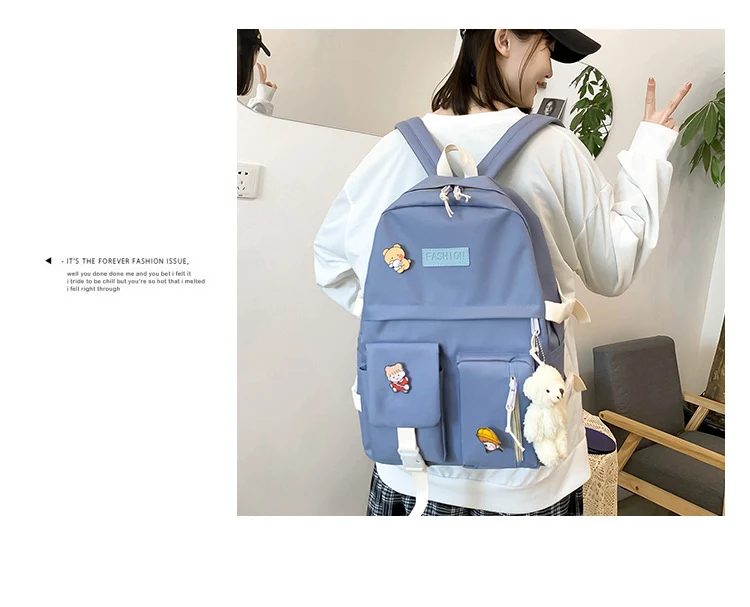 Mochila Estudantil Universitária de Lona com Cinco Peças e Cores Contrastantes. Conforto e organização para seus estudos e dia a dia.